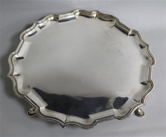 A George V silver salver with piecrust border, Jonathan Howell, London, 1915, 38 oz.